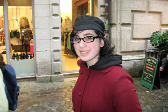 Strolling on the street with big clock in Rouen
